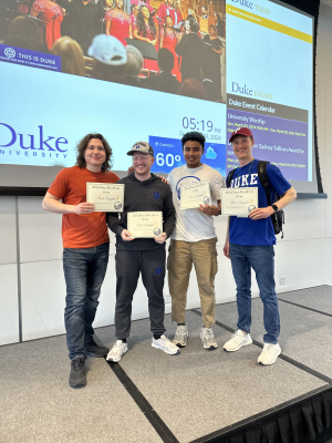 Team Tomato holding certificates at Duke DataFest