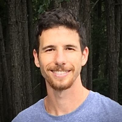 Omar Melikechi outdoors, smiling